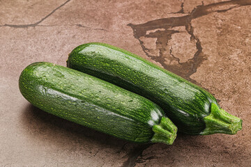 Raw green ripe zucchini vegetable