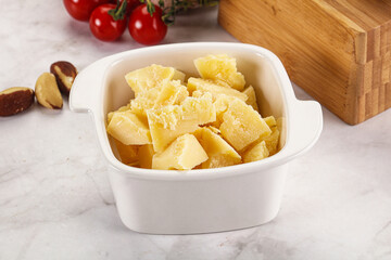 Crushed parmesan cheese in the bowl