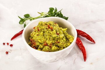 Guacamole with avocado, tomato and chili