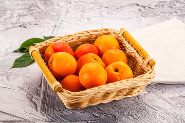 Raw ripe sweet apricots heap