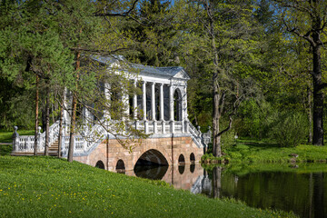 marble bridge in Catherine Park in the city of Pushkin near St. Petersburg on a clear spring morning