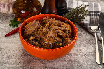 Shredded slow cooked pork meat