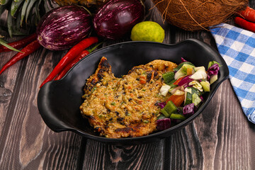 Tasty chicken steak with vegetables