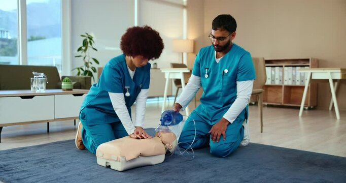 First aid, training or nurse with cpr on dummy for cardiac arrest, emergency healthcare, AED lesson or rescue. Medical simulation, people or learning compression for heart attack survival or teamwork