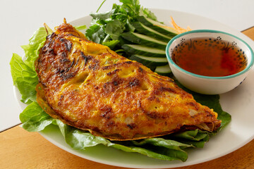 A view of a plate of banh xeo.