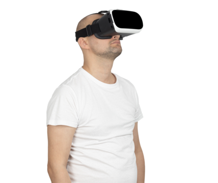 Man in white t-shirt wearing VR headset and looking up
