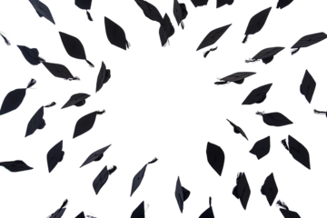 Graduation caps flying in a circular pattern against a black background, symbolizing achievement and celebration.