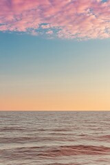 Serene ocean view under pastel skies, reflecting calmness and tr