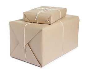 Parcels wrapped in kraft paper isolated on white