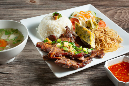 A view of a plate of Com Tam Suon Bi Cha.