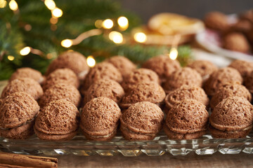 Homemade nut shaped Christmas cookies filled with cocoa cream