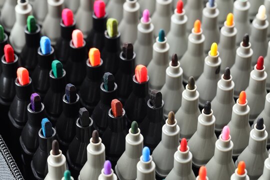 Many colorful markers in bag, closeup. Art supplies