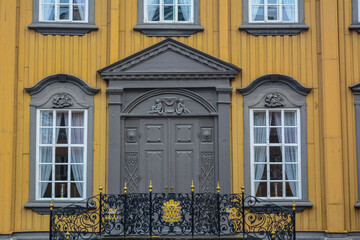 Entrance view of the Baroque, Rococo and neoclassicism style wooden Stiftsgarden royal residence built in 1774 in Trondheim, Norway