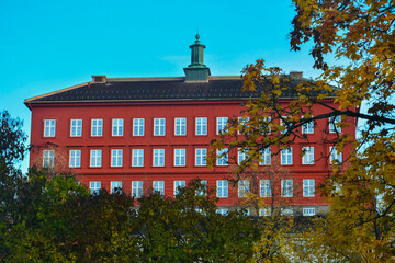 The large, characteristic red brick building of Bishop's Hill school built in early 1900's at the top in the Mollenberg area of Trondheim, Norway
