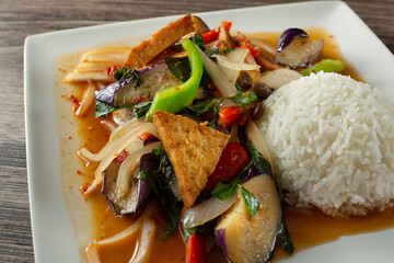 A closeup view of a Chinese spicy eggplant entree.
