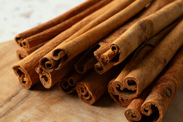 A closeup view of a pile of cinnamon sticks.