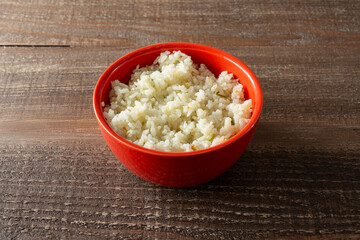 A view of a bowl of garlic rice.