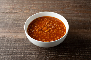 A view of a bowl of baked beans.