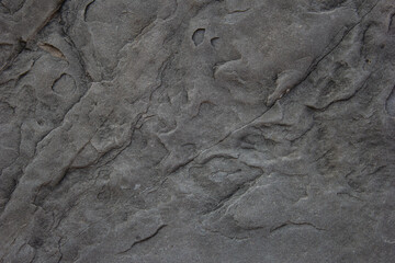 Real stone background with natural sand patterns. Stone background with scratches and patterns