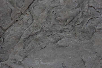 Real stone background with natural sand patterns. Stone background with scratches and patterns