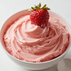 A close-up of a creamy strawberry dessert in a bowl, showcasing its smooth texture, vibrant.