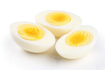 Slice of boiled egg on white background