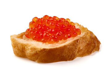 Red caviar on a crispy bread slice, isolated on white background.