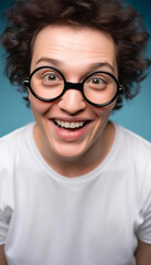 Fototapeta premium Extreme close up portrait of a person wearing oversized glasses, laughing heartily as they are caught in the middle of a silly prank.
