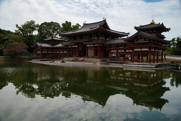 View with its reflection in the water of the Byōdō-in, and its garden, is a Buddhist temple located in the city of Uji, Kyoto, Japan. The image appears on the 10 yen coin. World Heritage Site.
