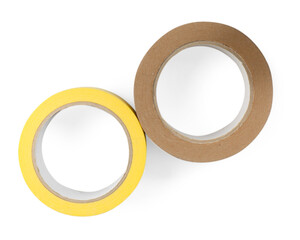 Rolls of adhesive and masking tapes isolated on white, top view