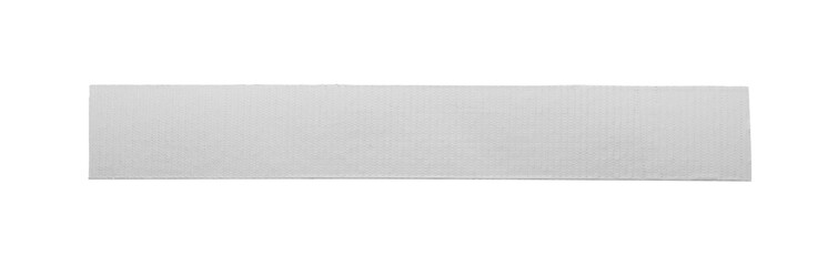 Strip of silver adhesive tape on white background, top view