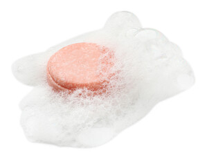 Pink soap with foam on white background