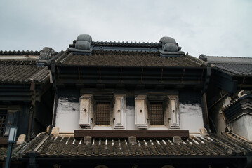 Fototapeta premium Warehouse-style buildings with clay and wood walls of Kawagoe City, originating from the Edo period of Japan. Kawagoe City is also known as Little Edo.