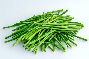 Fresh green chives heap isolated on white background, raw organic cooking herbs and garnish ingredients for culinary use.