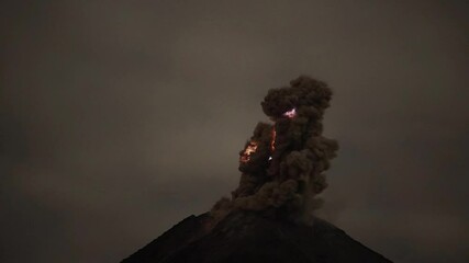 Volcanic lightning in ash clouds during eruption from of Colima volcano in Mexico.