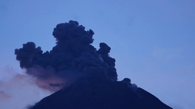 Volcanic lightning in ash clouds during eruption from of Colima volcano in Mexico.