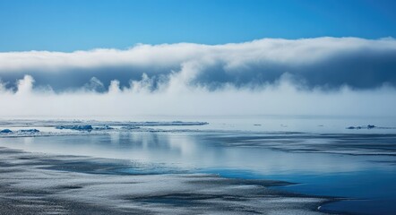 Obraz premium The Fog Lifts Over Utqiagvik: A Stunning Arctic Landscape in Barrow, Alaska