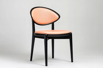 Elegant Peach Upholstered Chair with Black Frame and Cane Back, Isolated on White Background