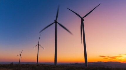 Wind Turbines at Sunset with Beautiful Sky and Landscape Background