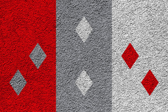 Official flag of Cocle. Province of Panama. Conceptual collage on the texture of a plastered wall