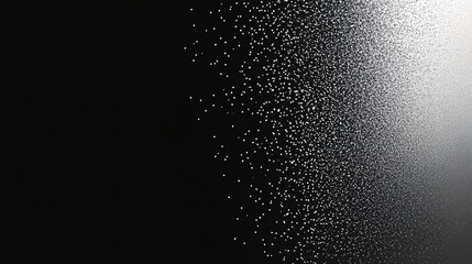 Obraz premium White Particles Dispersing Across Black Background