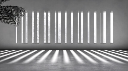 Obraz premium Vertical window slits cast stripes of light onto a gray floor, with a palm frond adding a touch of nature.