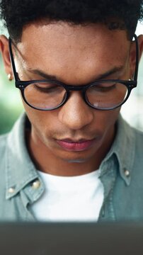 Glasses, laptop and journalist in office, man editing news draft and email source to verify story. Closeup, publishing agency and online for column research, proofreading and reporter for spell check