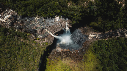 Salto do Rio Preto waterfall, Chapada dos Veadeiros Nacional Park, Goiás, Brazil, aerial view, large waterfall 120m high, sunny day, rainbow