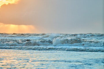 Sunset over north sea waves in Denmark. High quality photo