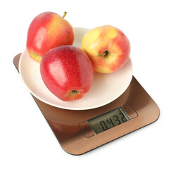 Electronic kitchen scale with plate of apples isolated on white