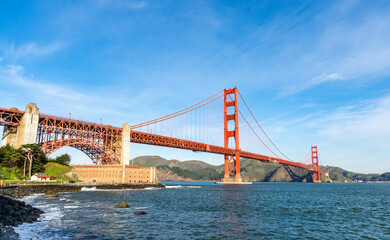 Surf in front of Golden Gate Bridge worldwide known symbol of California