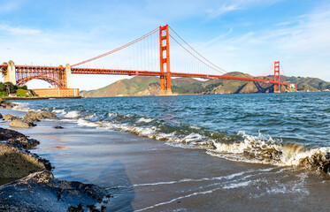 Surf in front of Golden Gate Bridge worldwide known symbol of California