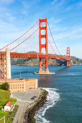 Surf in front of Golden Gate Bridge worldwide known symbol of California