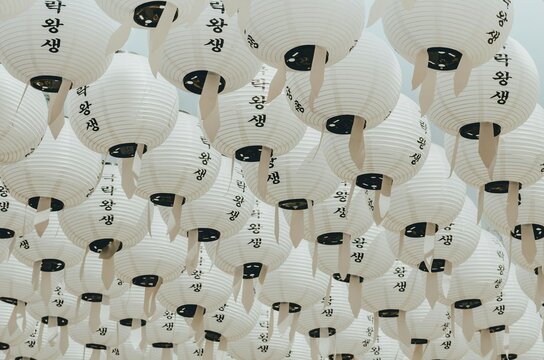 Low angle shot of lanterns hanging from a ceiling in North Korea